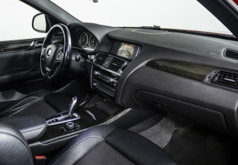 Подержанный автомобиль BMW X4 2015 года (9 фото)