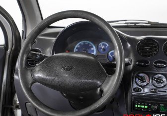 Подержанный автомобиль Daewoo Matiz 2012 года (13 фото)
