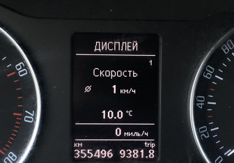 Подержанный автомобиль Skoda Octavia Wagon 2012 года (19 фото)