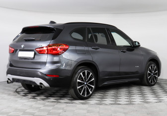 Подержанный автомобиль BMW X1 2017 года (2 фото)