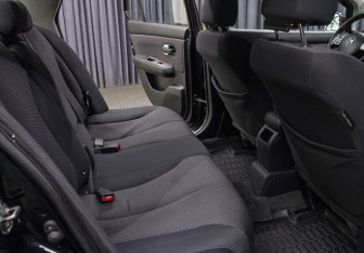 Подержанный автомобиль Nissan Tiida Sedan 2010 года (11 фото)