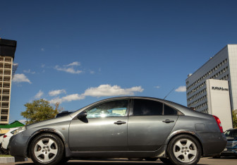 Подержанный автомобиль Nissan Primera Sedan 2003 года (6 фото)