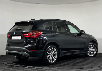 Подержанный автомобиль BMW X1 2017 года (2 фото)