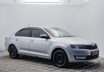 Подержанный автомобиль Skoda Rapid Liftback 2014 года (7 фото)