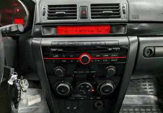 Подержанный автомобиль Mazda 3 Hatchback 2008 года (23 фото)