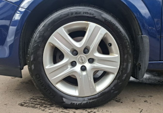 Подержанный автомобиль Opel Astra Sedan 2009 года (9 фото)