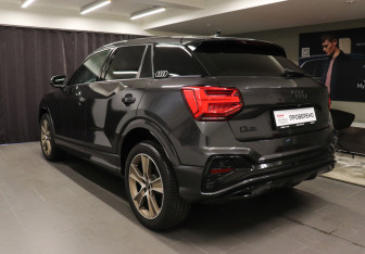 Подержанный автомобиль Audi Q2 2024 года (6 фото)