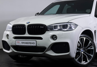 Подержанный автомобиль BMW X5 2014 года (20 фото)