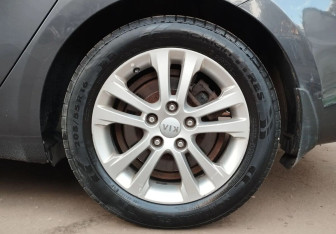 Подержанный автомобиль Kia Ceed Wagon 2013 года (14 фото)