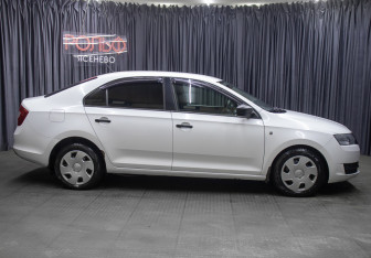 Подержанный автомобиль Skoda Rapid Liftback 2014 года (4 фото)