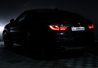 Подержанный автомобиль BMW X6 2016 года (18 фото)