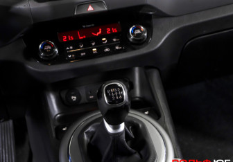 Подержанный автомобиль Kia Sportage 2015 года (15 фото)