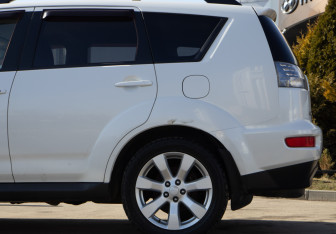 Подержанный автомобиль Mitsubishi Outlander 2011 года (7 фото)