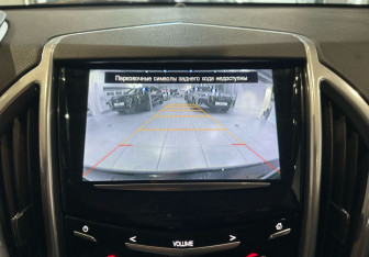 Подержанный автомобиль Cadillac SRX 2013 года (17 фото)