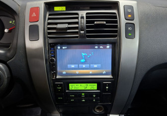 Подержанный автомобиль Hyundai Tucson 2008 года (14 фото)