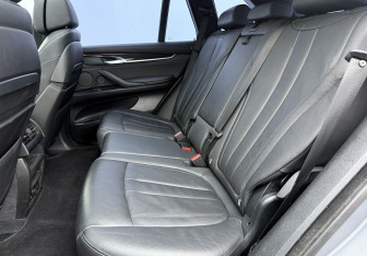 Подержанный автомобиль BMW X5 2014 года (10 фото)