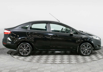 Подержанный автомобиль Ford Fiesta Sedan 2016 года (4 фото)