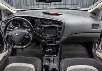 Подержанный автомобиль Kia Ceed Wagon 2014 года (14 фото)