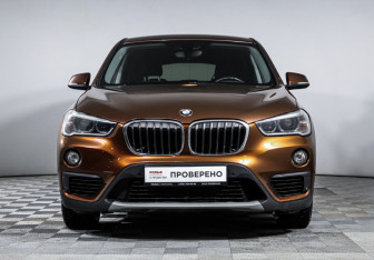 Подержанный автомобиль BMW X1 2015 года (2 фото)