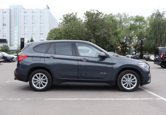 Подержанный автомобиль BMW X1 2015 года (4 фото)