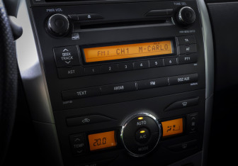 Подержанный автомобиль Toyota Corolla Sedan 2012 года (18 фото)