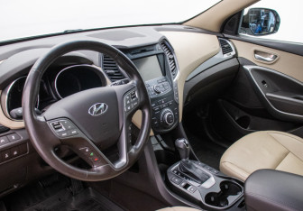 Подержанный автомобиль Hyundai Santa Fe 2014 года (9 фото)