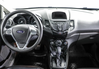 Подержанный автомобиль Ford Fiesta Sedan 2017 года (7 фото)