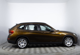 Подержанный автомобиль BMW X1 2013 года (4 фото)