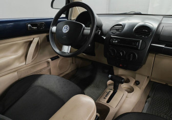 Подержанный автомобиль Volkswagen Beetle Hatchback 1999 года (11 фото)