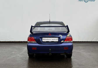 Подержанный автомобиль Mitsubishi Lancer Sedan 2003 года (6 фото)