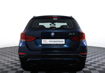 Подержанный автомобиль BMW X1 2012 года (6 фото)