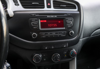 Подержанный автомобиль Kia Ceed Wagon 2014 года (17 фото)