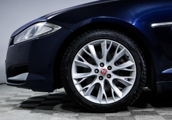Подержанный автомобиль Jaguar XF Sedan 2014 года (15 фото)
