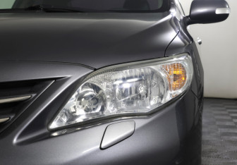 Подержанный автомобиль Toyota Corolla Sedan 2012 года (21 фото)