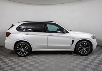 Подержанный автомобиль BMW X5 2014 года (4 фото)