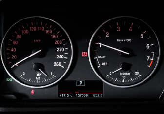 Подержанный автомобиль BMW X1 2015 года (11 фото)
