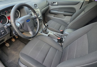 Подержанный автомобиль Ford Focus Wagon 2010 года (9 фото)