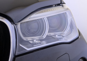 Подержанный автомобиль BMW X6 2015 года (11 фото)