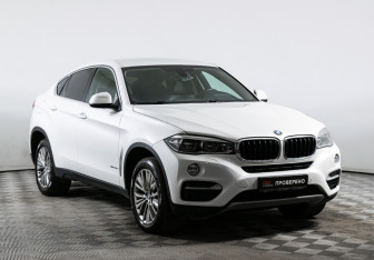 Подержанный автомобиль BMW X6 2015 года (3 фото)