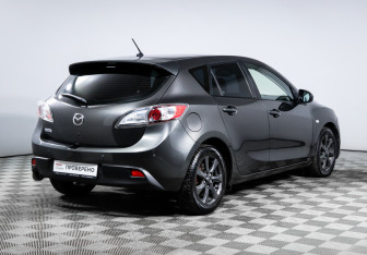 Подержанный автомобиль Mazda 3 Hatchback 2009 года (5 фото)