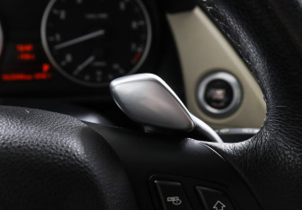 Подержанный автомобиль BMW X1 2009 года (18 фото)