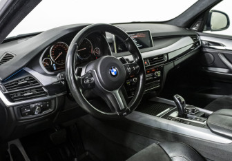 Подержанный автомобиль BMW X5 2016 года (11 фото)