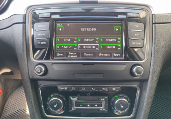 Подержанный автомобиль Skoda Superb Liftback 2013 года (13 фото)