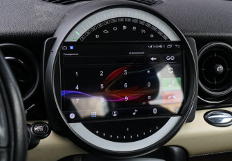 Подержанный автомобиль MINI Hatch 2008 года (12 фото)