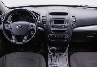 Подержанный автомобиль Kia Sorento 2014 года (13 фото)