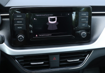 Подержанный автомобиль Skoda Rapid Liftback 2021 года (14 фото)