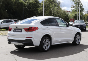 Подержанный автомобиль BMW X4 2015 года (5 фото)