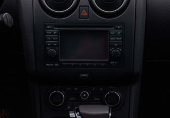 Подержанный автомобиль Nissan Qashqai+2 2012 года (13 фото)
