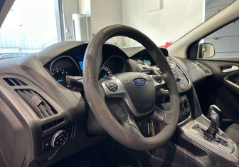 Подержанный автомобиль Ford Focus Hatchback 2014 года (12 фото)