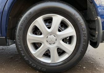 Подержанный автомобиль Mitsubishi Outlander 2014 года (9 фото)